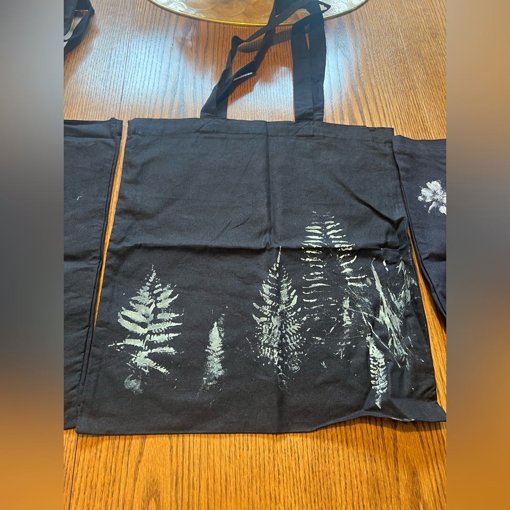 Black / off white canvas Tote Bags with Fern/ flowers Designs. Prints from plant